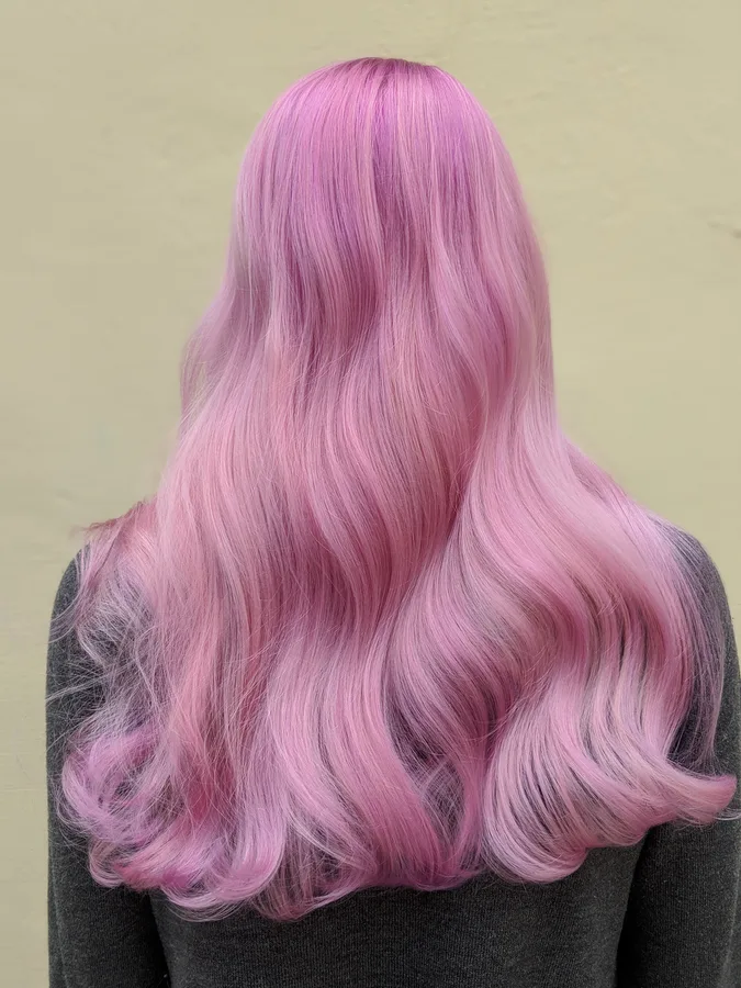 Long pink hair with a smooth, high-shine finish