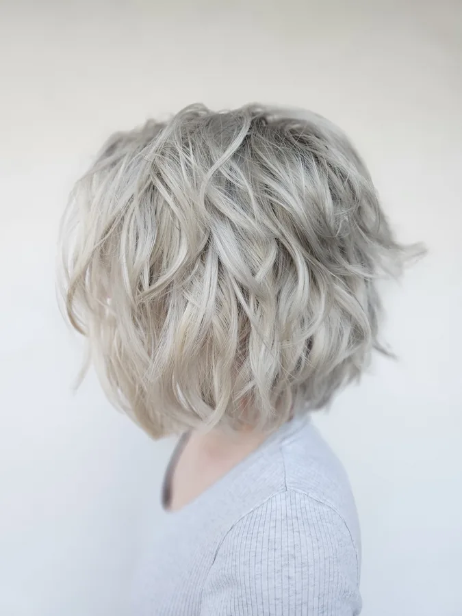 Short textured bob in cool silver blonde