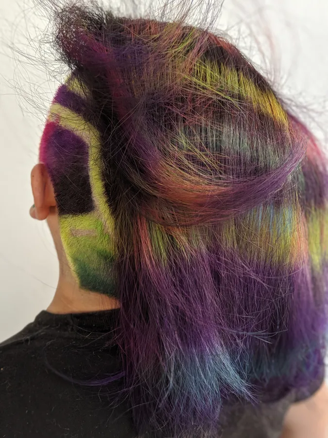 Shaved side design combined with multi-toned vivid color